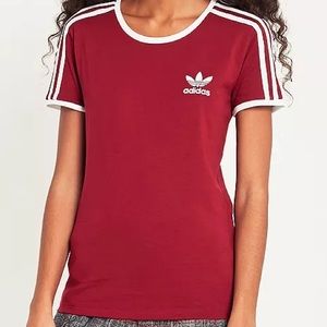 Adidas woman’s S red logo tee with white stripes on shoulders